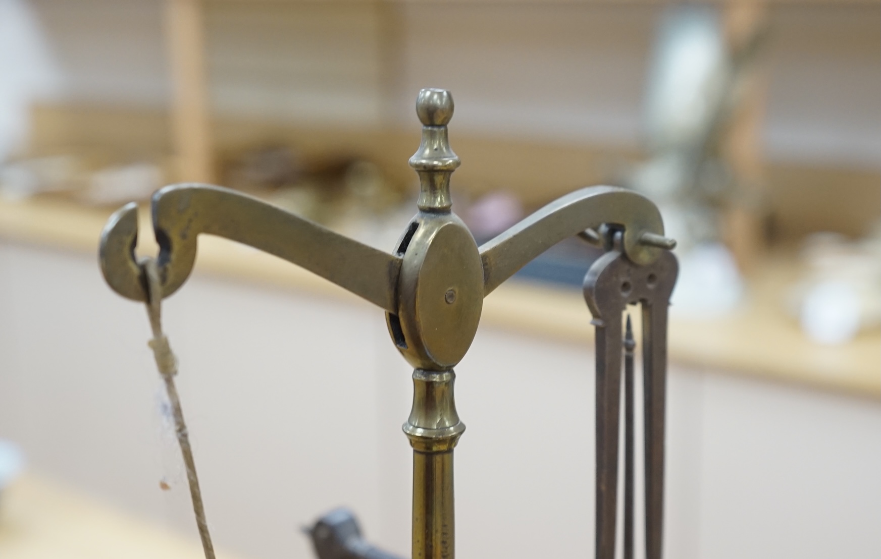 A set of Victorian mahogany and brass beam scales, by Avery, with a repair letter dated 1940 included, 45cm high. Condition - fair